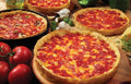 Four Deep Dish Pizzas O522